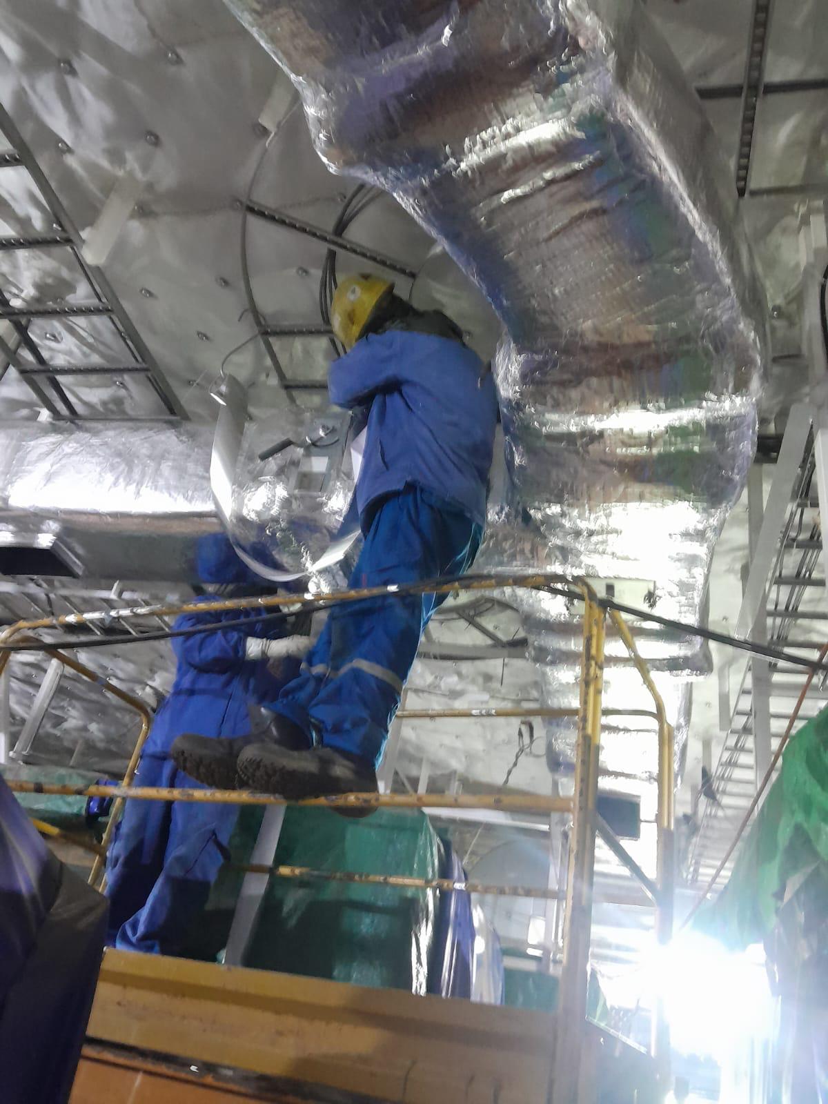 Professional thermal insulation work showing specialized insulation materials and installation techniques